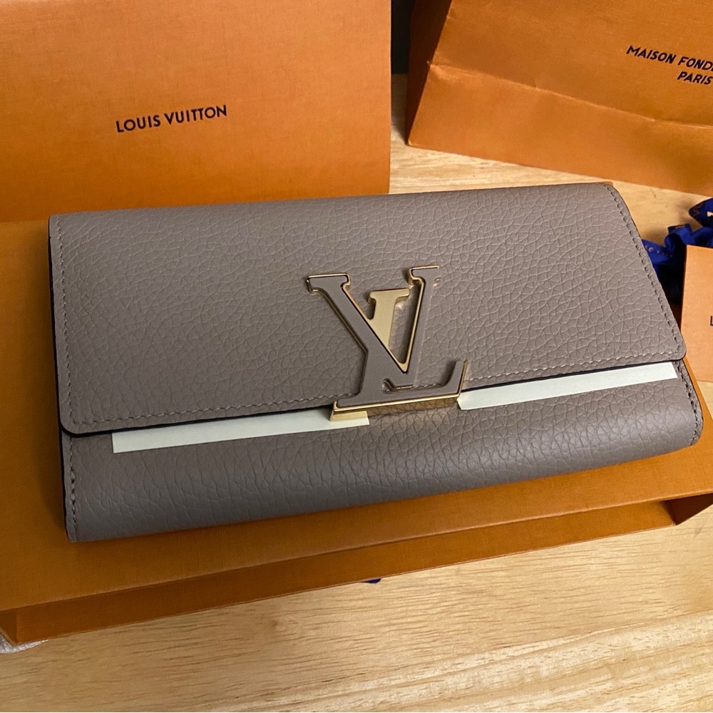 Louis Vuitton Gray Leather wallet